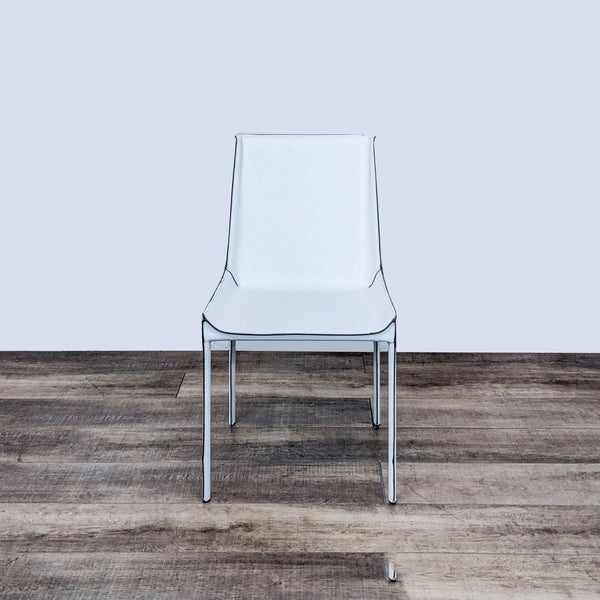 Zuo Modern Fashion dining chair with a slim design, upholstered in white recycled leather, against a minimalist background.