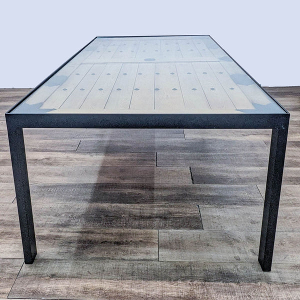 Alt text 1: Tansu Design dining table with a Parsons style metal base and 19th century Japanese door under glass.