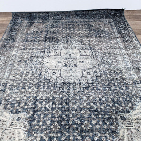 Alt text 1: Vintage-inspired Kellum Medallion area rug by NuLoom, 5'11"x9', displayed on a floor showcasing its intricate design and varied blue-gray tones.