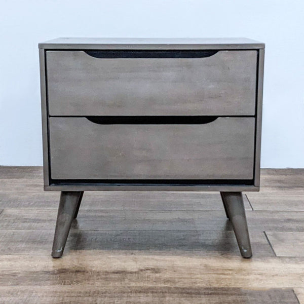 Solid wood mid-century style end table by Furniture Of America with two drawers and flared legs.