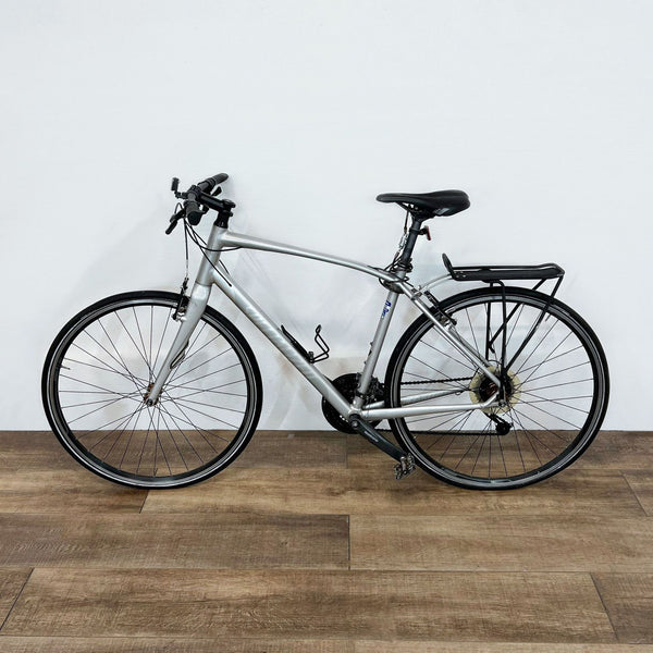 Sleek Specialized commuter bike with durable aluminum frame and rear rack, ideal for urban cycling.