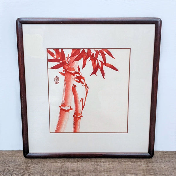 Alt text 1: A tranquil red bamboo print by Reperch, framed in a dark border, promoting a warm, serene aesthetic for home decor.