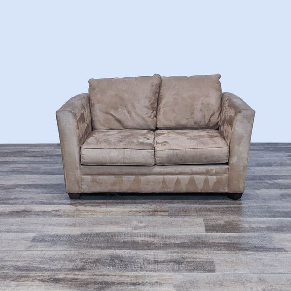 Reperch brand loveseat in warm brown microfiber with framed arms and dark feet, frontal view.