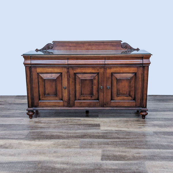 Alt text 1: Ethan Allen branded sideboard with beveled doors and turned feet, showing a detailed carved back panel.