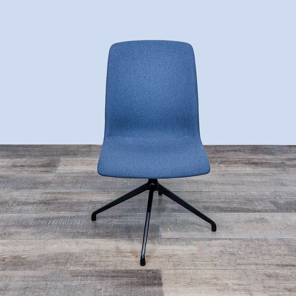 Alt text 1: OFS Hairpin side chair with a blue upholstered ergonomic seat and black steel base, on wood flooring.