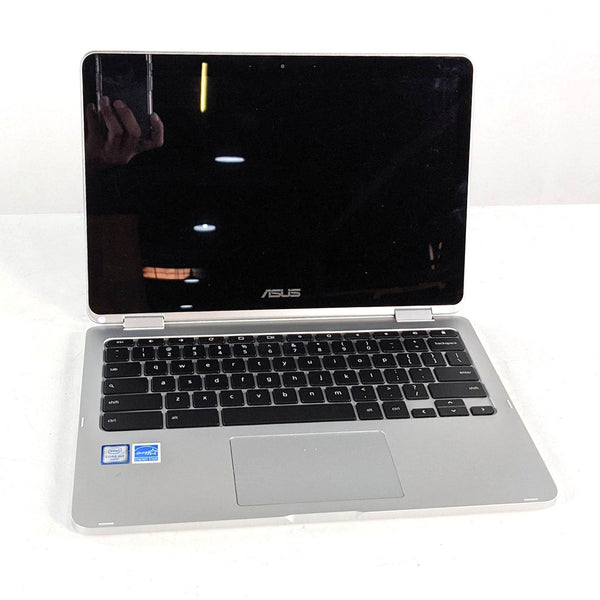 Alt text 1: Asus laptop with a black screen and visible keyboard, must be connected to power to function.