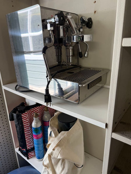 Expobar Espresso Machine with portafilter, stainless steel body, and dual gauges for precise brewing.