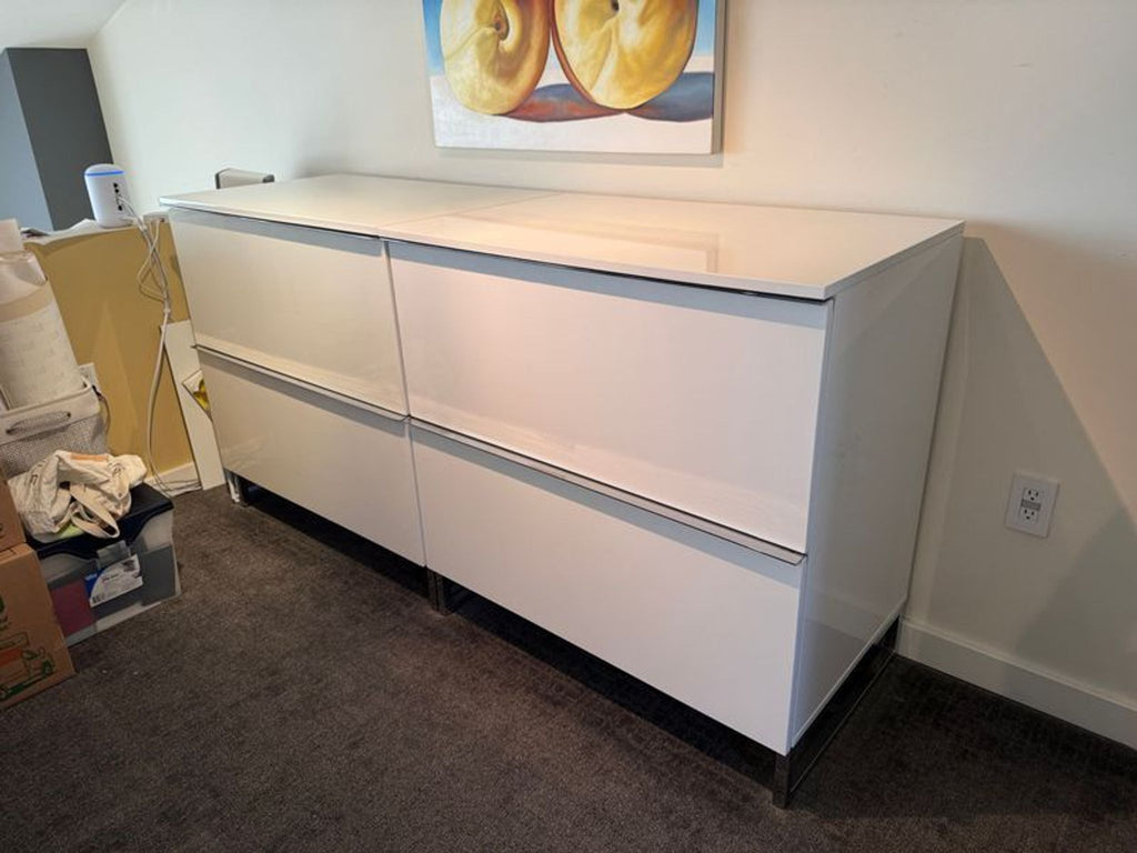 2. Modern dresser by Scandinavian Design featuring clean lines and a light-toned wood exterior.  