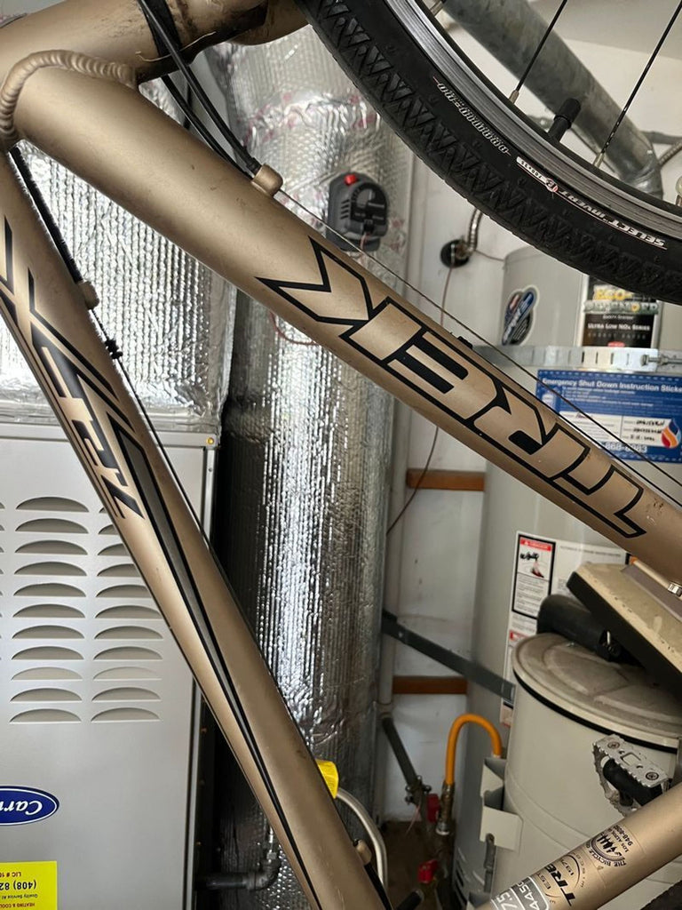2. Side view of a Trek 7.2 FX bike, black frame visible, branded as Trek, priced at $420.  
