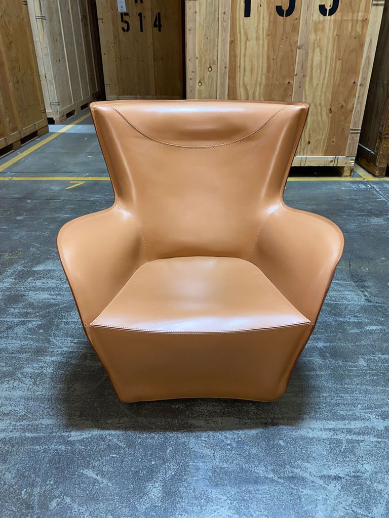 Mandrague Swivel Chair by Molten & C, 2015, modern curved lounge chair with distinctive sculptural design.