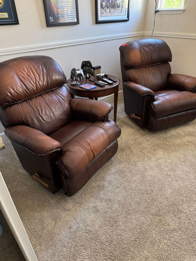 1. Modern leather massage recliner chair in a cozy lounge setting, designed for comfort and style.