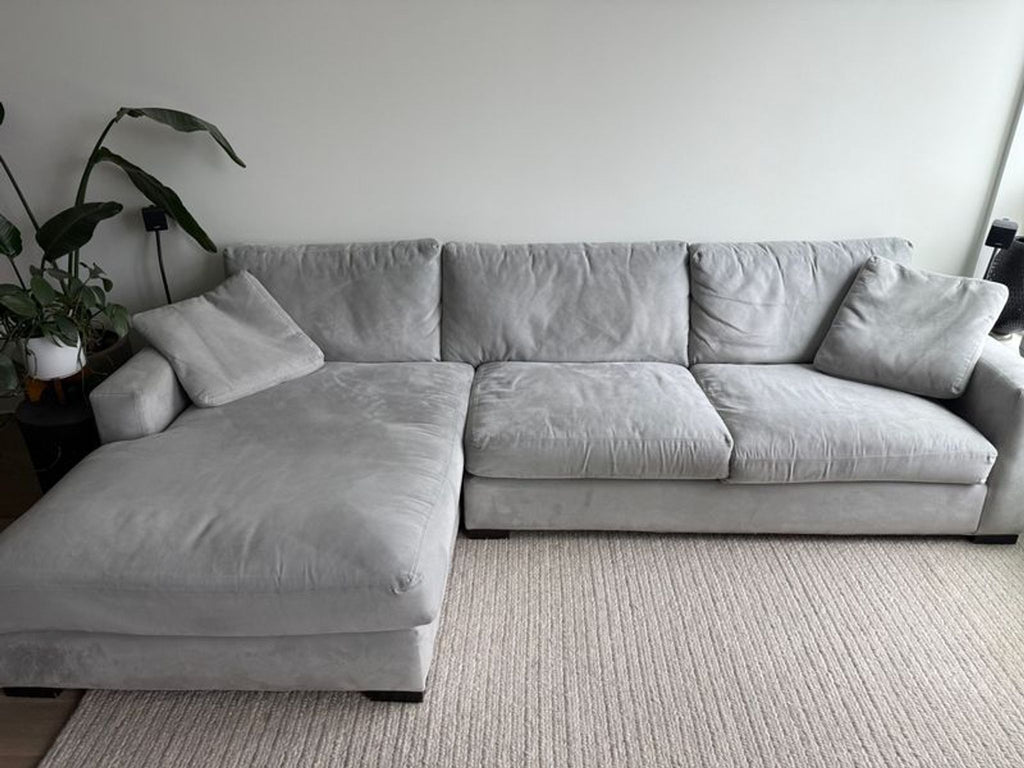 Room and Board 3-seater couch with clean lines and plush cushions, ideal for stylish seating arrangements.  