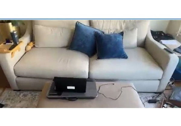 1. Modern Crate and Barrel 3-seat couch with sleek lines and neutral upholstery shown in a living room.  