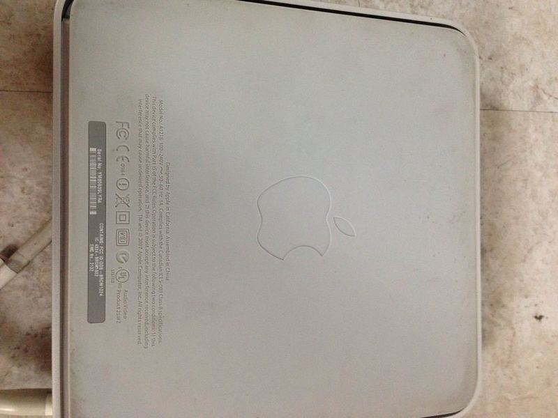 3. Bottom view of Apple TV A1218 showing Apple logo and device information, category Other, brand Apple.