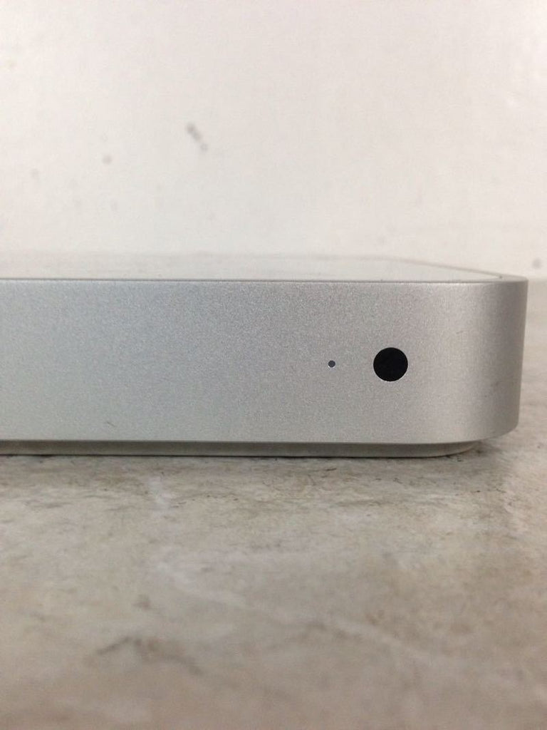 2. Close-up of the Apple TV A1218 front panel with indicator light and port, brand Apple, category Other.  