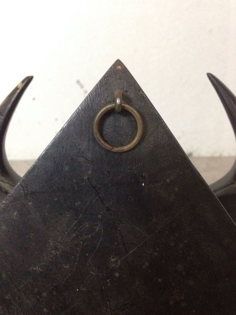 2. Close-up of the hanging ring on the back of a Reperch water buffalo wall hanging.