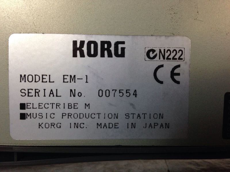 2. Manufacturer label for Korg EM-1, showing model, serial number, and made in Japan details.