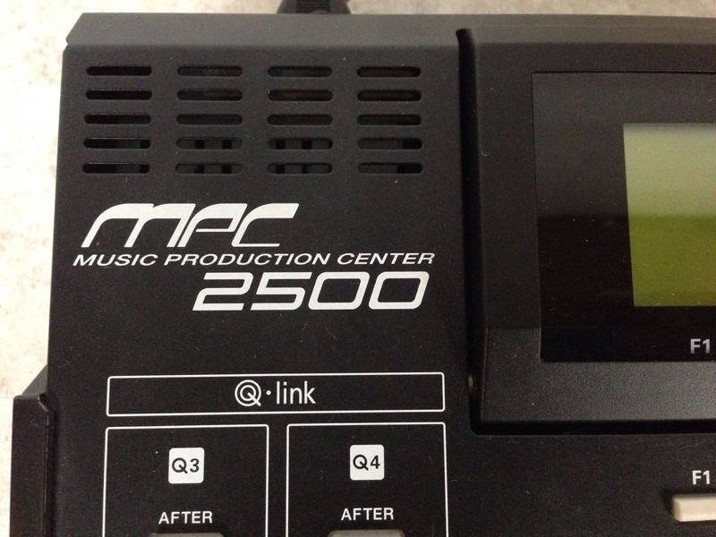 2. Close-up of Akai MPC2500 logo and Q-link controls, highlighting the music production center branding.