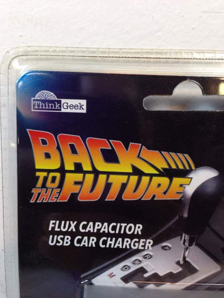 2. Close-up of Back to the Future USB Car Charger packaging, showing Think Geek branding and product title.