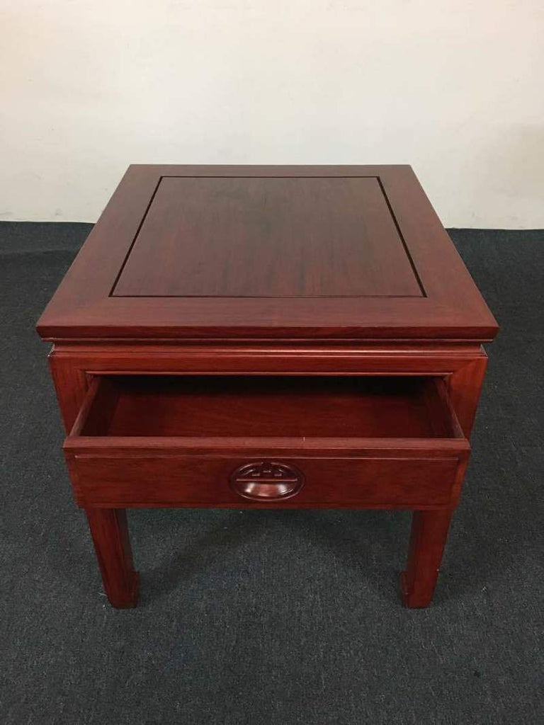 2. Top-down angle of a Reperch Chinese rosewood end table with its storage drawer pulled open.