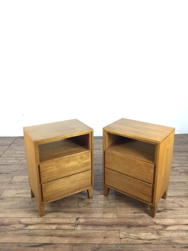 1. Pair of Conant Ball end tables with two drawers each and a shelf above, shown on a wooden floor.
