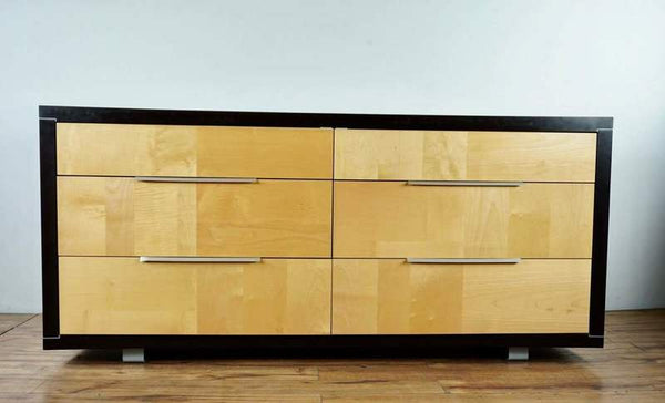 1. Modern Reperch dresser in wood with black lacquer, metal inlay, and hardware, made in Italy, closed drawers.