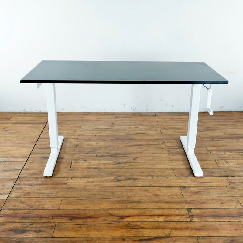 3. Reperch manual desk, metal construction, laminate surface, stamped by maker; designed for workspace durability.