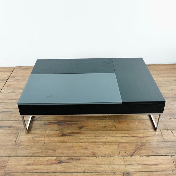 1. Reperch coffee table with walnut veneer, charcoal gray glass top, and metal legs, viewed from above.