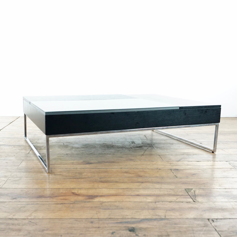 2. Modern Reperch coffee table featuring walnut veneer, gray glass top, and sleek metal legs, side view.