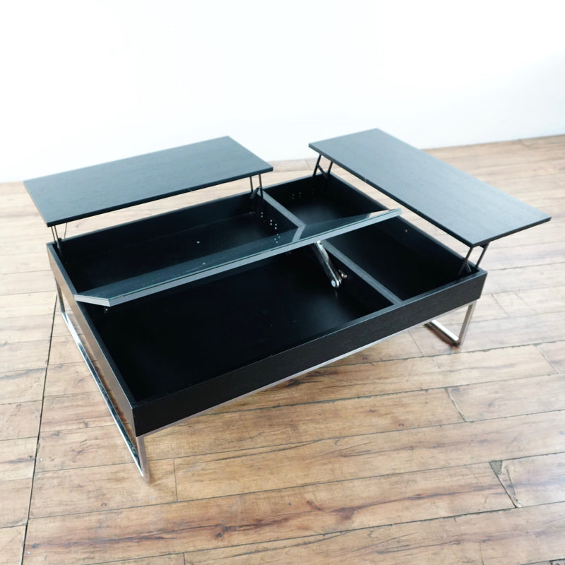 3. Reperch coffee table with walnut veneer, charcoal gray glass, metal legs, and open lift-top storage sections.