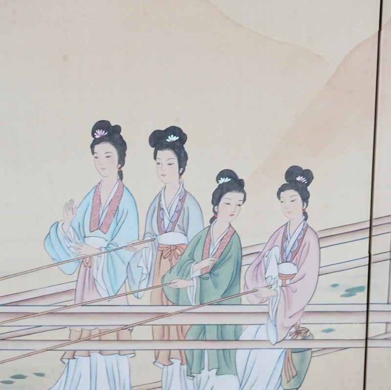 - Close-up of four women in pastel robes, standing and sitting on a wooden terrace in hand painted detail.  