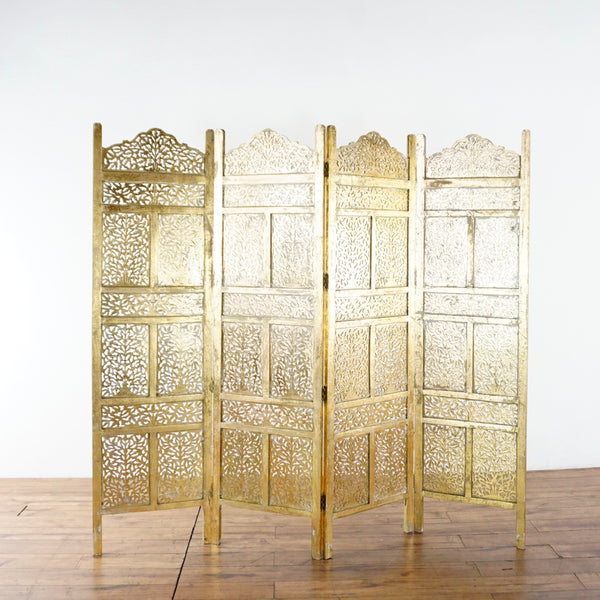 1. Ornate gold-toned wood screen divider with intricate carvings, four panels, made in India by Reperch.