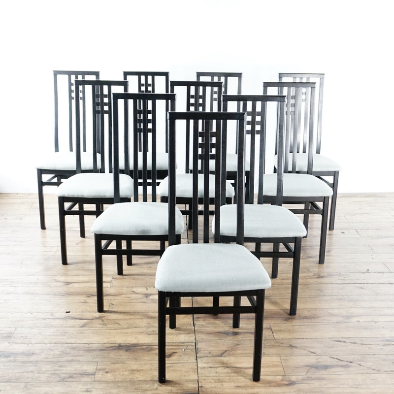 1. Set of newly reupholstered IMS dining chairs with tall, black wooden frames, made in Italy, arranged in rows.