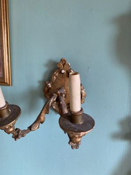 1. Antique Reperch wall sconce, ornate gold finish, two candle-style lights, shows signs of age, 200 years old.