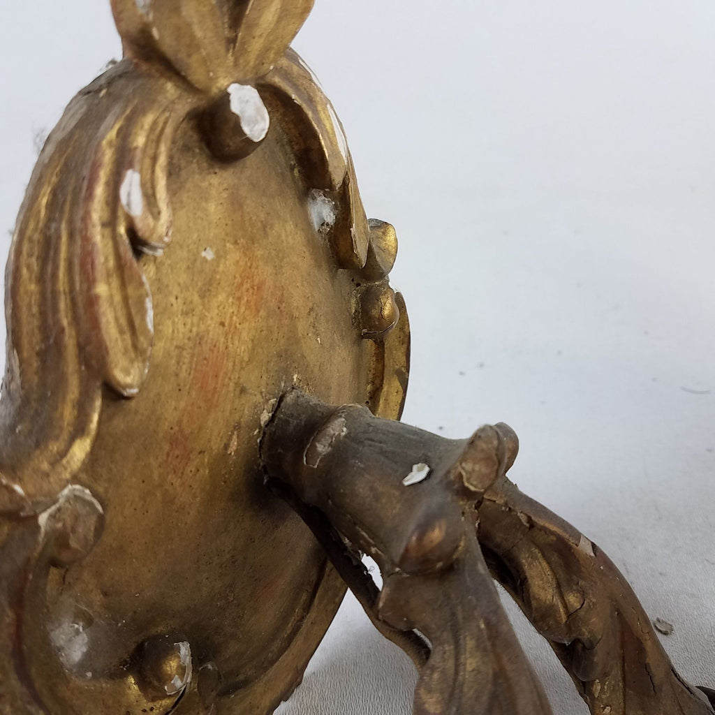 3. Detailed view of the backplate on an antique Reperch sconce, gold patina, visible wear, Lighting category.