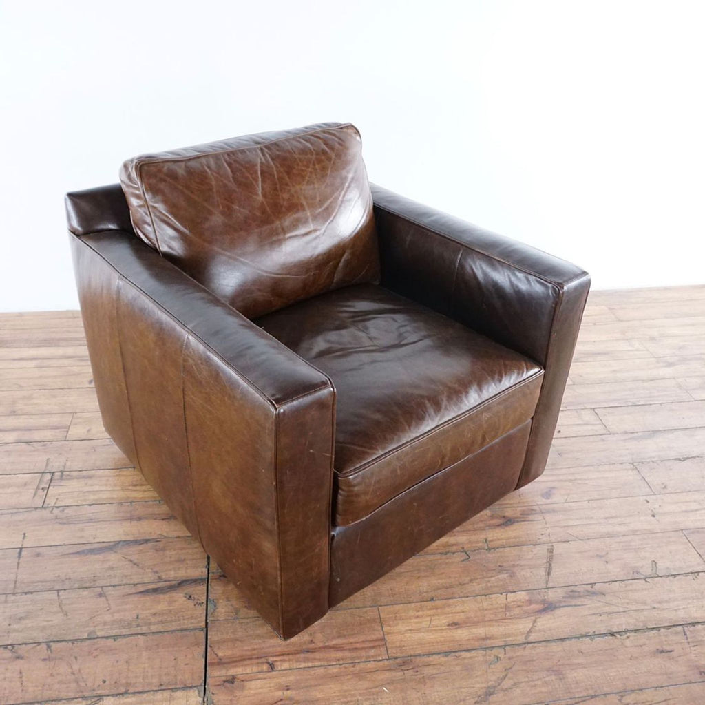 Crate & Barrel Barrett Leather Track Arm Swivel Chair