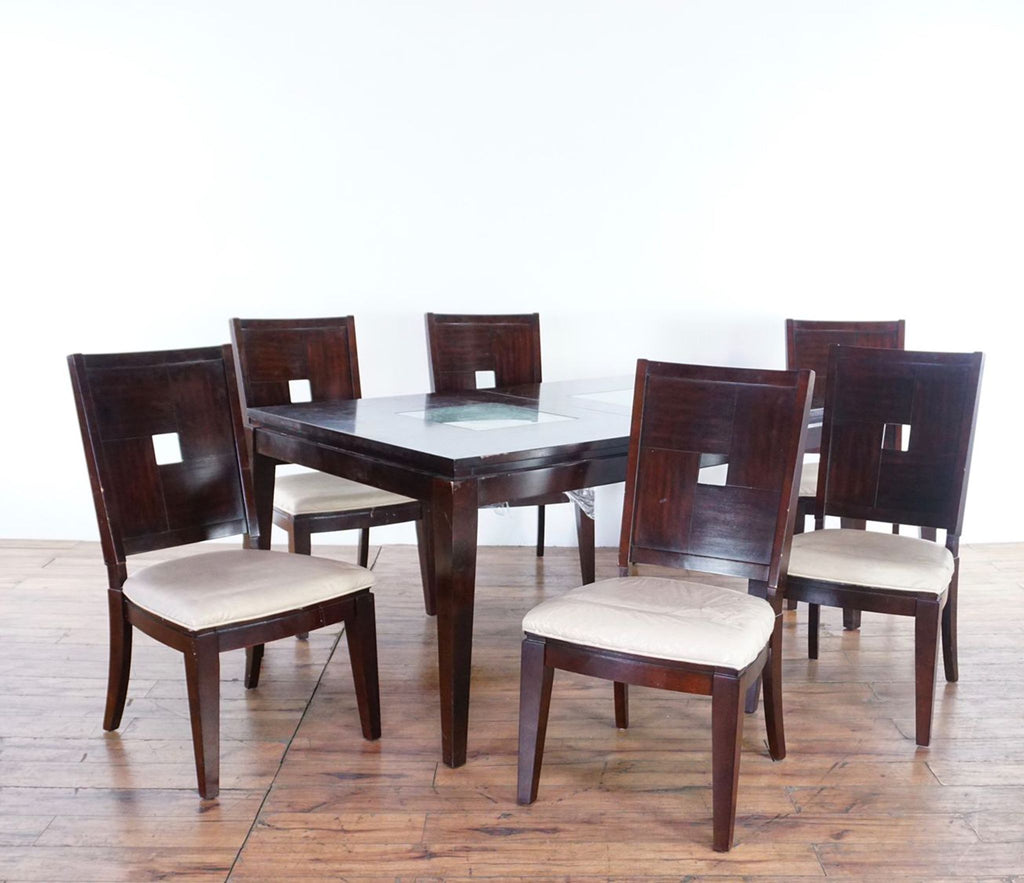 1. Reperch dining set with expandable table featuring crackle glass inserts and six matching chairs.