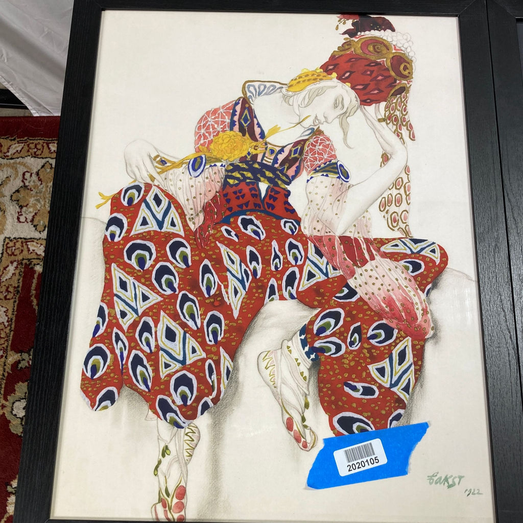 3. "Close-up of a Reperch print featuring an ornate, abstract human figure in vibrant red and blue patterns, framed in black."