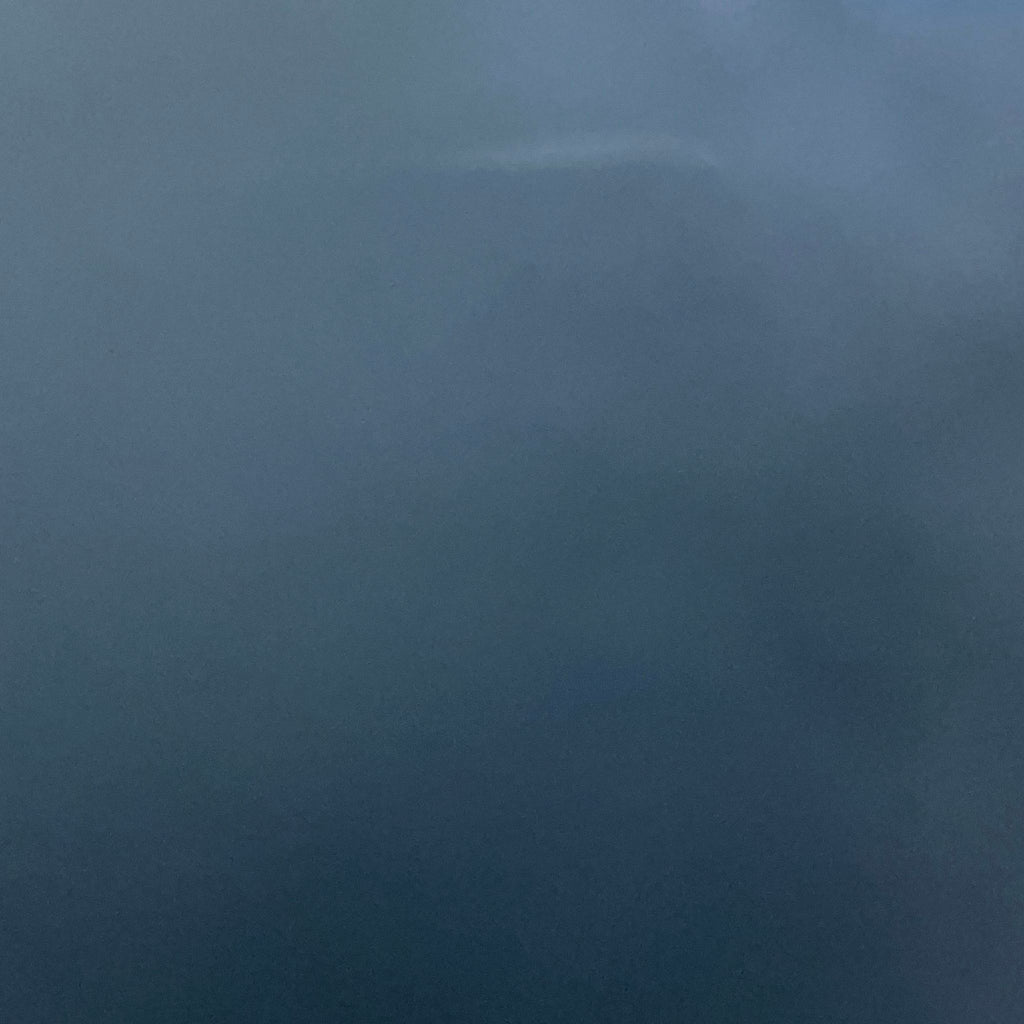 the sky is a dark blue color.