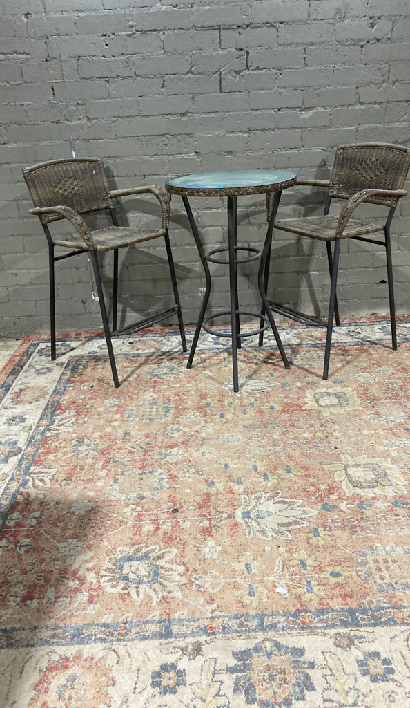 a set of four rattan and rattan bar stools.