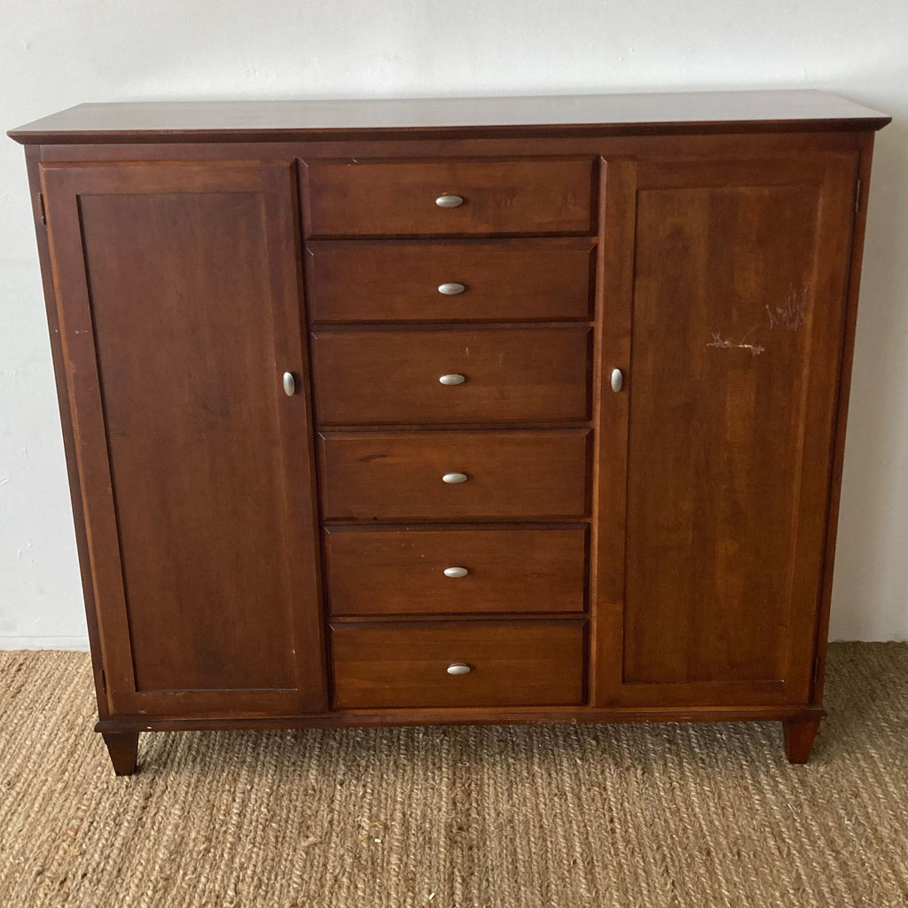 Ethan Allen dresser with five central drawers and two side cabinets.