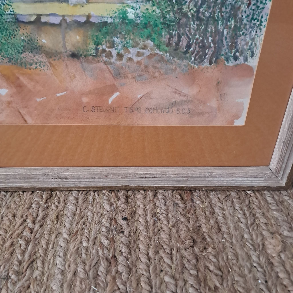 3. Close-up of the framed artwork's bottom corner with the signature "C. Stewart T.S. 98 Comondú B.C.S."
