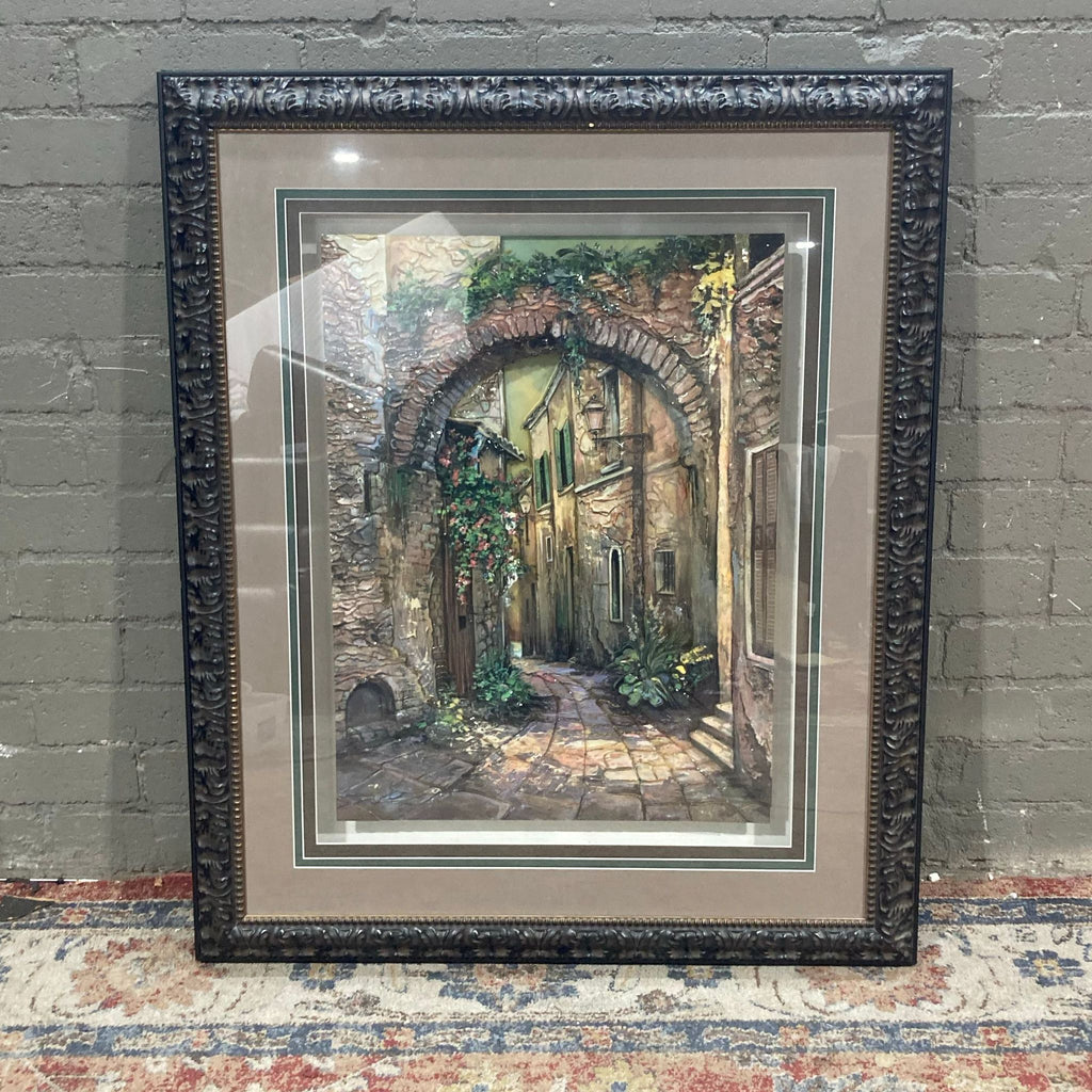 1. Framed Reperch art piece featuring a rustic alleyway under a stone arch, with lush greenery accents, 40x4x49.