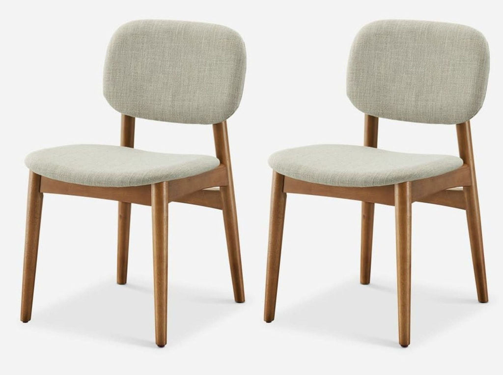 1. Pair of Castlery dining chairs with bent wood, fabric upholstery, and rubber wood legs, shown at an angle.