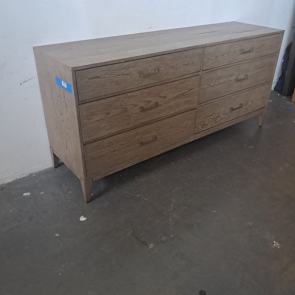 3. Light wood dresser from Restoration Hardware; six roomy drawers, metal handles, and simple contemporary style.