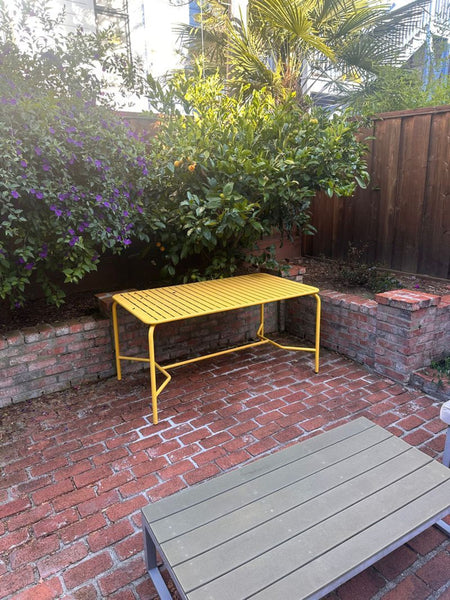 Medium rectangular coral outdoor dining table with slatted top by Petite Friture, from the Tables category.