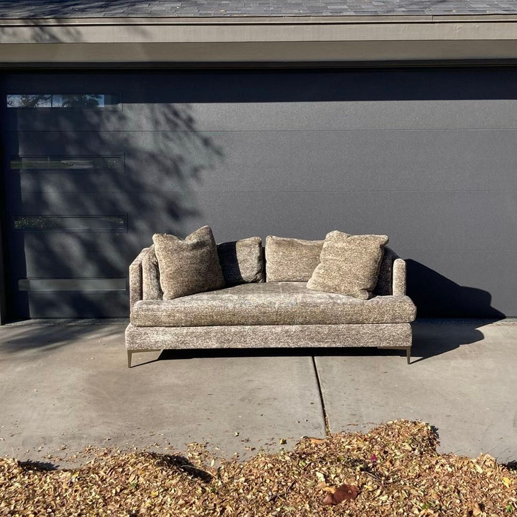 Theodore Alexander 3-seat sofa with plush cushions, soft fabric, metal legs, and a modern, neutral design.