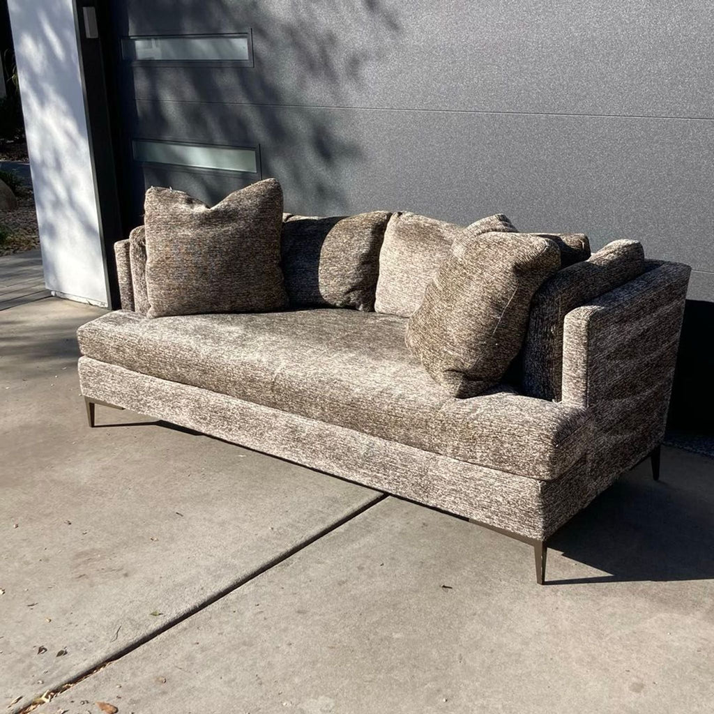 Modern Theodore Alexander 3-seater with comfy upholstery, sleek metal legs, and a versatile neutral shade.