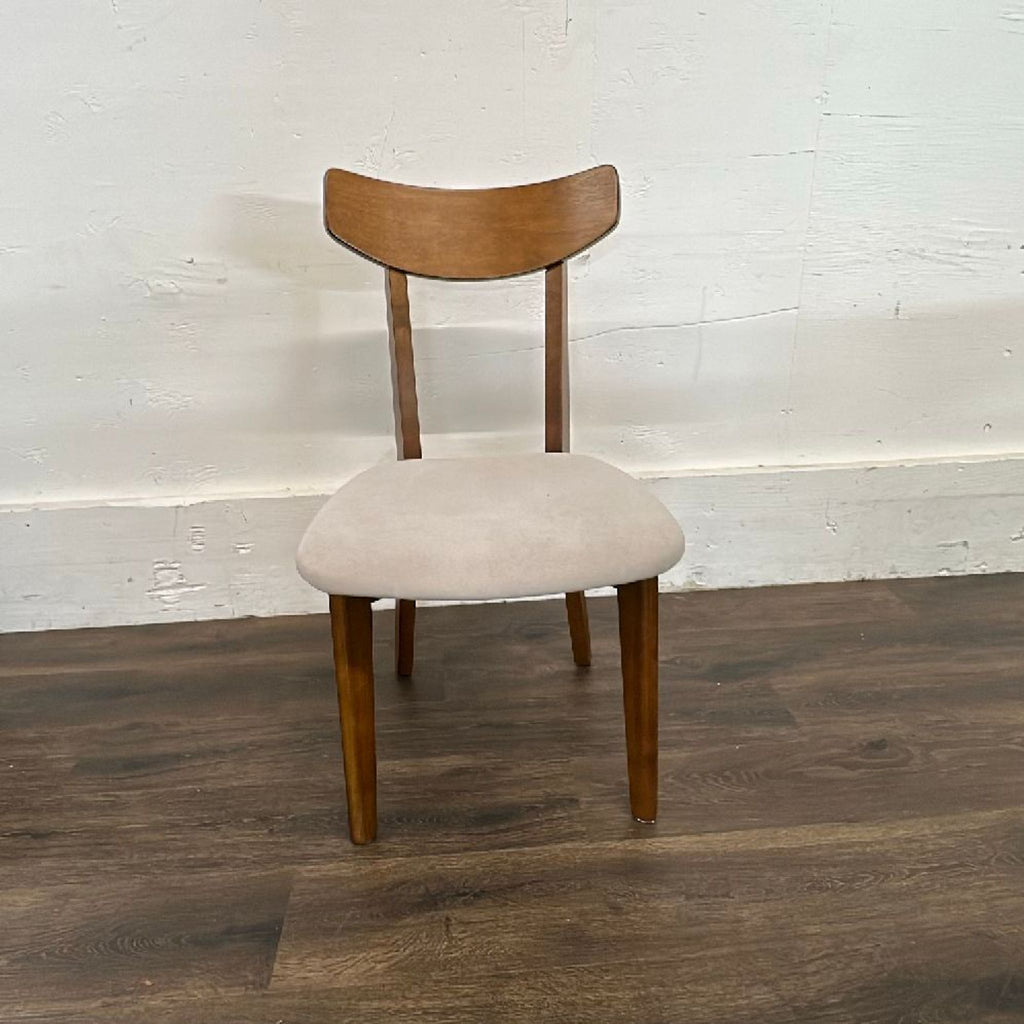 Mid-century modern Target dining set with table and six chairs in a bright interior.  
