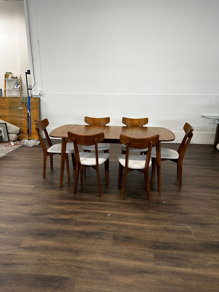 Dining room set from Target featuring a mid-century modern table and six matching chairs.